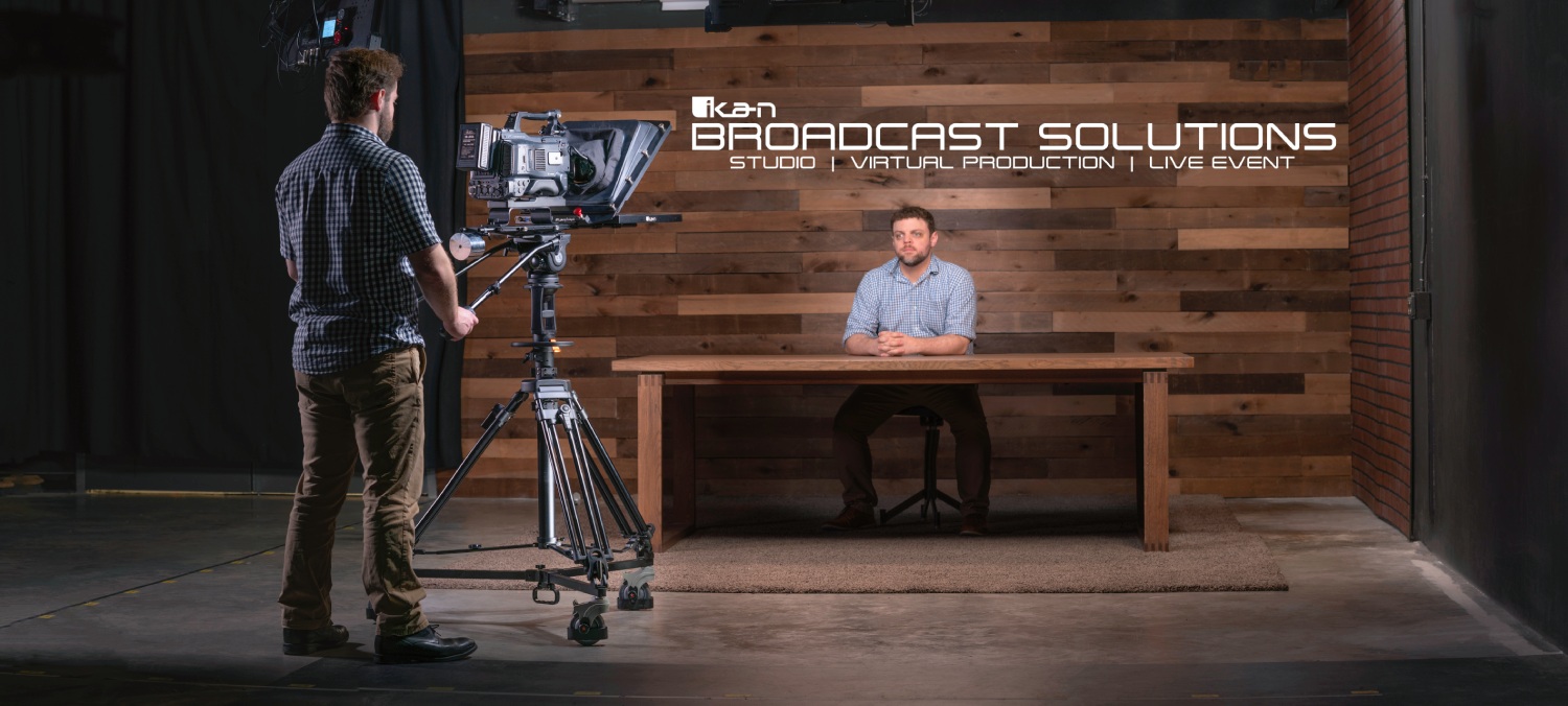 ikan broadcast turnkey solution that includes a teleprompter, pedestal, and dolly, in front of an LED volume for virtual production