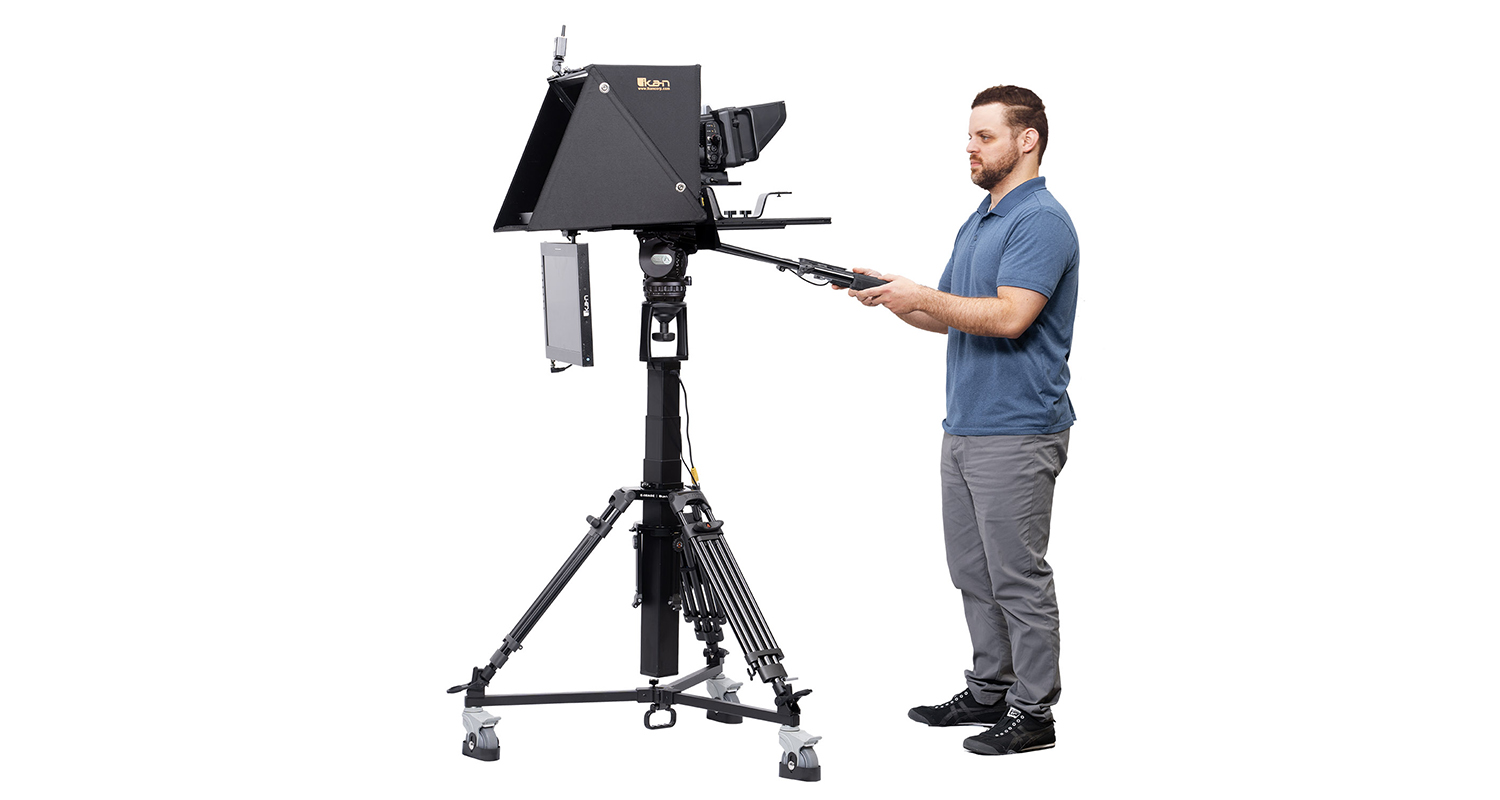 a camera man operates a motorized camera pedestal system with an included professional video fluid head that can hold a payload of 55 lbs. the column itself can hold payloads with a capacity of 66 lbs and the smooth motorized column provides steady shots