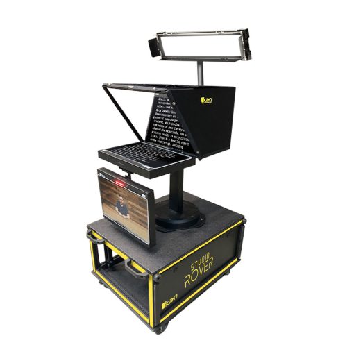 The Studio Rover is a fully integrated mobile media cart designed for professional broadcasting in corporate, remote, educational, and telemedicine environments. The image shows a compact, portable AV setup featuring a collapsible rack-mounted system with a PTZ camera, script monitor, talent monitor, Q-SYS control interface, Blackmagic switcher, Sennheiser wireless microphone and IFB system, dual media players, and a Pearl Nano for recording and live streaming. The cart also includes advanced lighting controls, electric green screen operation, full IP-based teleprompter control, NDI/SDI/HDMI compatibility, and a motorized camera pedestal. Built with durable construction and designed for ease of transport and one-touch operation, the Studio Rover simplifies high-quality content creation for executives, CEO's, teachers, professors, doctors, nurses, preachers, priests, and non-technical users alike.