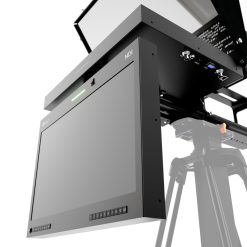 Close-up of the 19-inch widescreen NDI talent monitor attached below the Ikan PT419W-NDI-TMN teleprompter via a 15mm rod system, displaying a sample feed with green tally light illuminated, and visible input buttons for NDI, SDI, HDMI, and more.