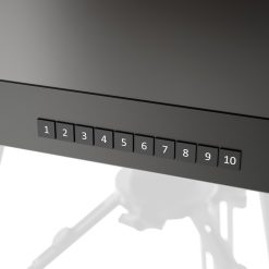 Front view of the 19-inch Ikan M19W-NDI teleprompter monitor with a black screen, illuminated red tally light on top, Ikan logo on the left, NDI logo on the right, and bottom controls including input buttons (NDI, SDI, HDMI, VGA, AV, Flip, Menu) and numbered preset buttons 1 through 10. NDI Monitor